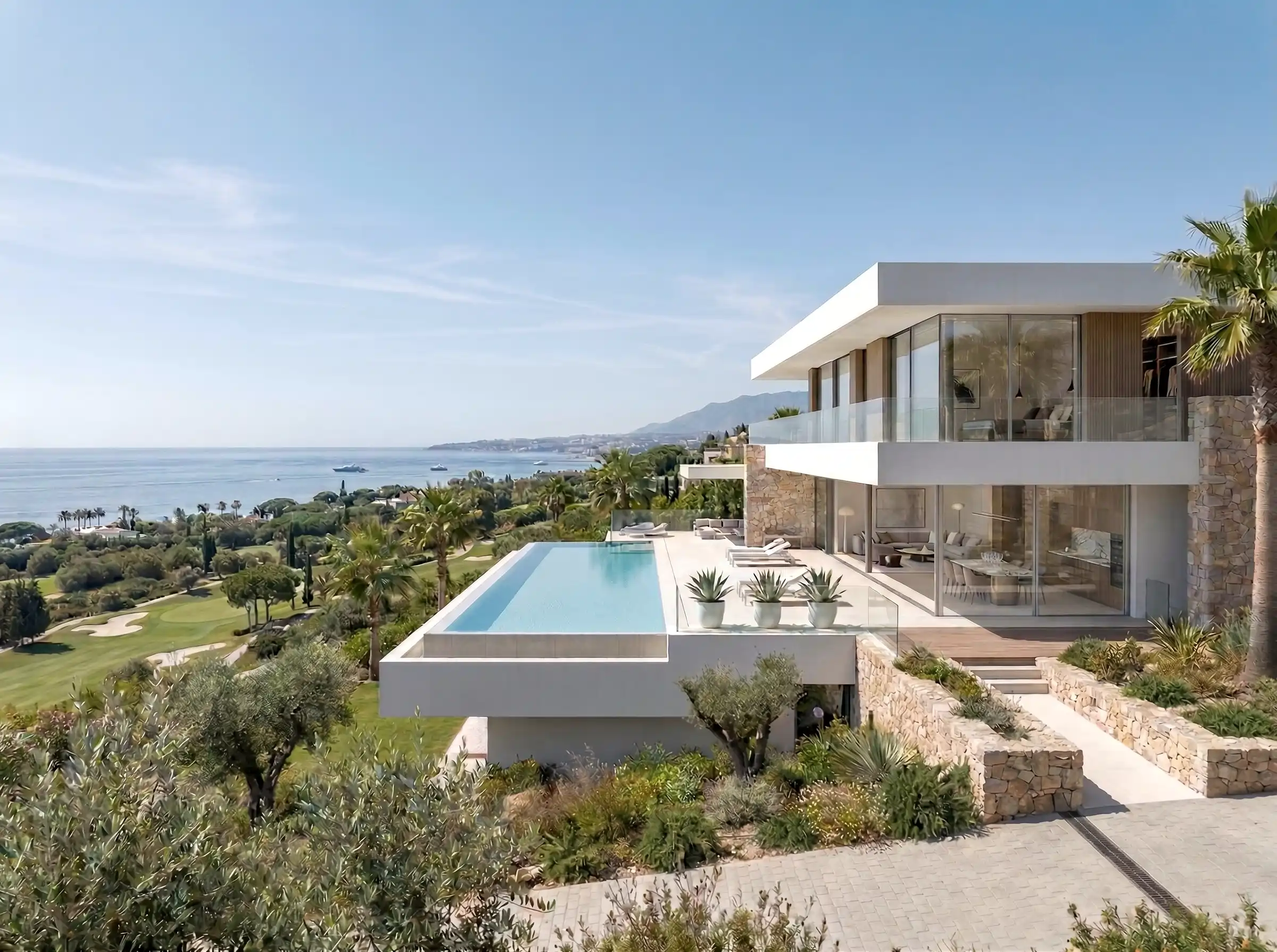 Architects and interior designers specializing in luxury new build villas in marbella. Exterior with sea view.