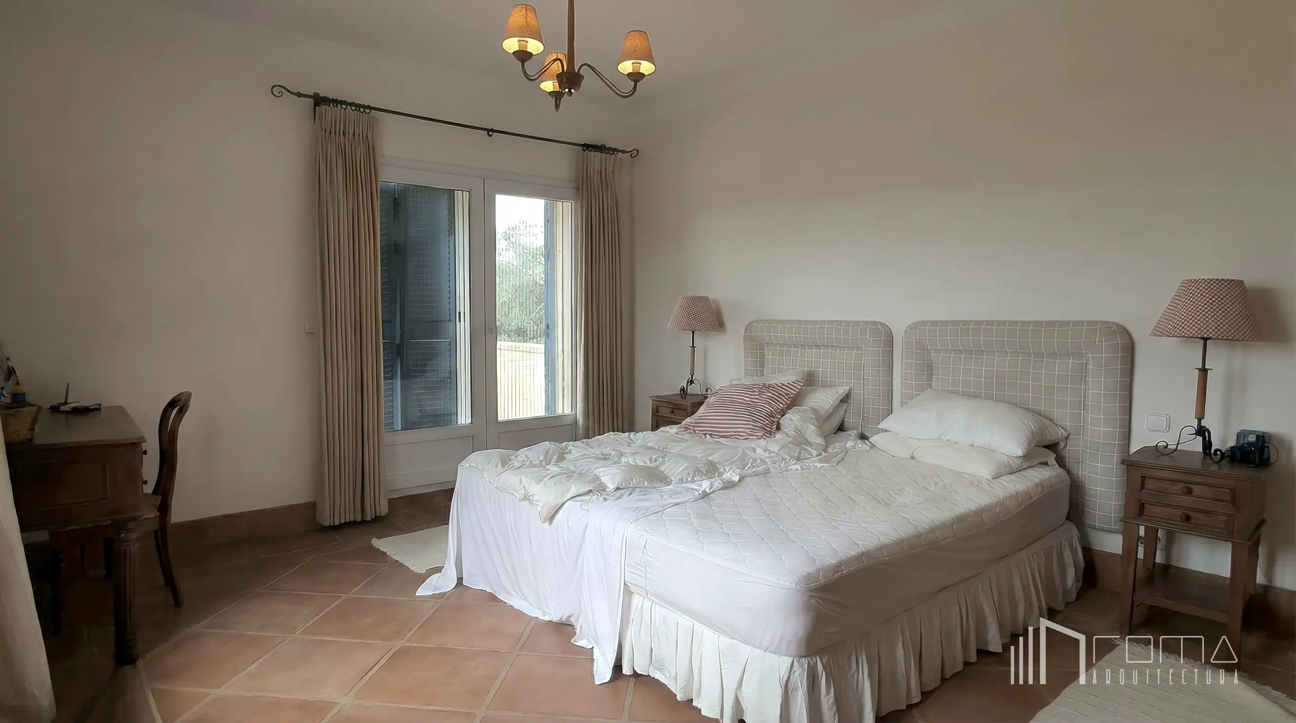 Interior design 3 Empty master bedroom featuring traditional terracotta tiled flooring prior to renovation, showcased within the interior design portfolio by roma arquitectura studio