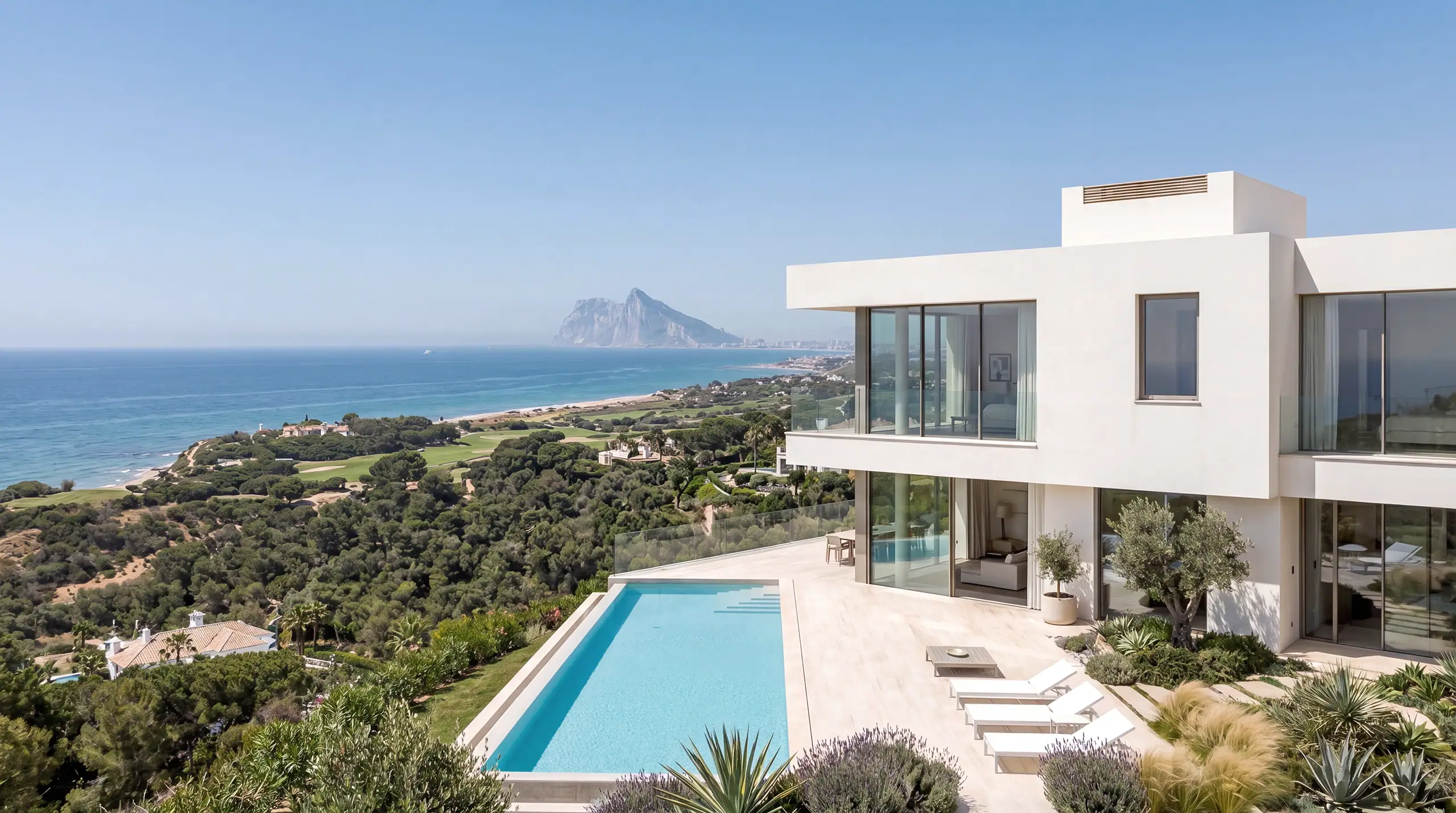 Modern cliffside luxury villa with infinity pool and panoramic mediterranean views towards gibraltar by roma arquitectura studio — new builds service