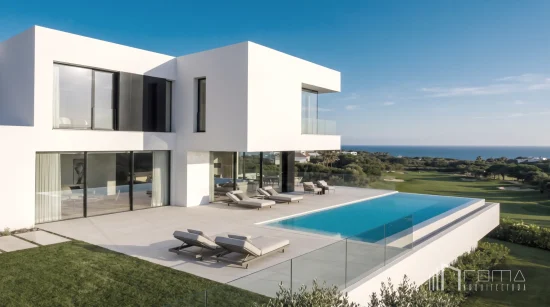 Malaga architects and interior designers 1 Contemporary multi-level villa exterior with infinity pool and manicured mediterranean garden. Malaga turnkey new build projects, designed by roma arquitectura studio.