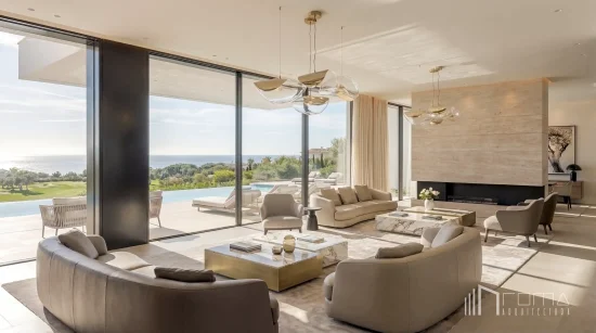 Modern new build villa in costa del sol, malaga. Architects and interior designers specializing in bespoke projects for luxury villas. Lounge with fireplace