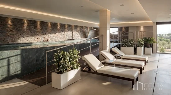 Luxury indoor spa relaxation area with white loungers, indoor plants and heated pool in benahavis by roma arquitectura studio, premier la zagaleta architects.