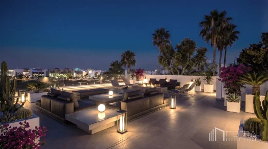 Luxury rooftop lounge at dusk featuring a modern fire pit, architectural lighting, and panoramic views, executed by roma arquitectura studio, leading architects in puerto banus
